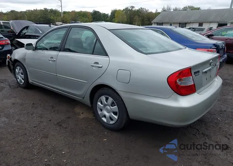 2002 Toyota Camry Le z USA, uszkodzony, nr VIN 4T1BE32K42U112639